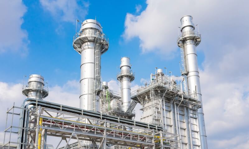 Petrochemical industrial facility with process towers and stacks